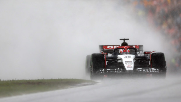 Liam Lawson of New Zealand driving the (40) Scuderia AlphaTauri AT04 in the rain during the F1 Grand Prix of The Netherlands at Circuit Zandvoort on August 27, 2023 in Zandvoort, Netherlands. (Photo by Lars Baron/Getty Images)