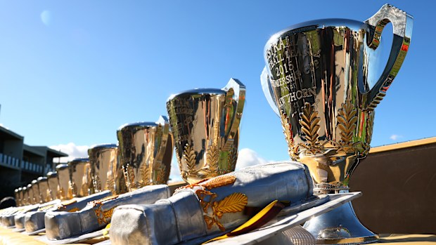 AFL premiership cups.