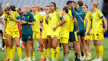 Players from Team Australia (Matildas) show dejection after losing to Germany.