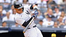 Aaron Judge #99 of the New York Yankees hits a fourth inning grand slam home run against the Milwaukee Brewers at Yankee Stadium on March 29, 2025 in New York City. New York Yankees defeated the Milwaukee Brewers 20-9. (Photo by Mike Stobe/Getty Images)