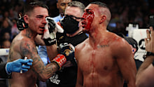 NEW YORK, NEW YORK - NOVEMBER 27:  Teofimo Lopez and  George Kambosos talk after their championship bout for Lopezs Undisputed Lightweight title at The Hulu Theater at Madison Square Garden on November 27, 2021 in New York, New York. (Photo by Al Bello/Getty Images)