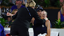Ajla Tomljanovic in the hands of a physio for treatment.