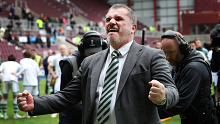 Angelos Postecoglou, manager of Celtic, celebrates after after winning his second league title with the club