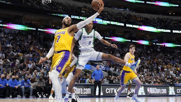Los Angeles Lakers forward Carmelo Anthony grabs a defensive rebound.