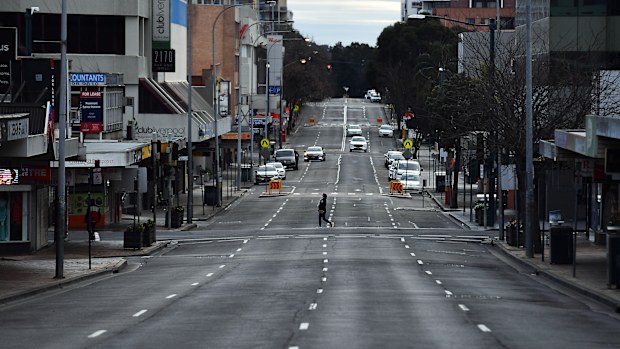 Shoppers walk on George Street in Liverpool, Sydney.