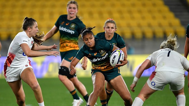 Faitala Moleka of Australia charges forward against England in Wellington.