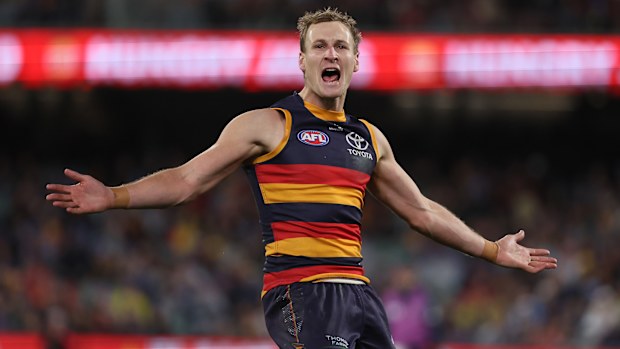 Jordan Dawson of the Crows celebrates a goal.