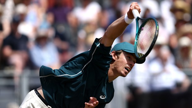 Alex de Minaur of Australia serves against Jiri Lehecka of Czechia during the Men's Singles First Round match on Day Nine of the 2025 HSBC Championships at The Queen's Club on June 17, 2025 in London, England.  (Photo by Dan Istitene/Getty Images)