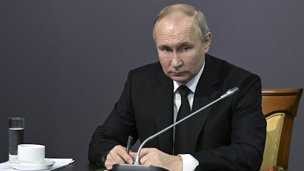 Russian President Vladimir Putin speaks during his meeting with WWII veterans and representatives of patriotic civil society associations at the State Memorial Museum of the Defense and Siege of Leningrad in St. Petersburg, Russia, Wednesday, Jan. 18, 2023 