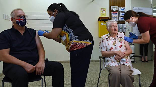 Australian Prime Minister Scott Morrison gets his COVID-19 booster  with Jane Malysiak in Blacktown, NSW.  
