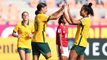 Sam Kerr of Australia celebrates scoring her side's first goal with Mary Fowler.