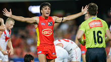 GOLD COAST, AUSTRALIA - MARCH 18: Elijah Hollands of the Suns reacts during the 2023 AFL Round 01 match between the Gold Coast Suns and the Sydney Swans at Heritage Bank Stadium on March 18, 2023 in the Gold Coast, Australia. (Photo by Russell Freeman/AFL Photos)