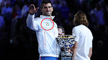 <p>It would surely be arrogant to think Novak Djokovic was expecting to win a 22nd grand slam when he arrived in Melbourne a fortnight ago.</p><p>But when he pulled on a custom-made jacket with a sparkling silver "22" emblazoned on the ﻿breast following Sunday's victory, one had to wonder.</p><p>When he was asked about by James Bracey on Nine's post-match coverage, Djokovic simply blushed and tried to divert from the topic.</p><p>But Jim Courier was under no illusions as to the significance.</p><p>﻿"We always discuss the fact that do the players care about the numbers and the records," Courier queried.</p><p>"The jacket said it all tonight. It was something he was aspiring to. Novak unabashedly wants all the records."</p><p>The detail in the jacket was not missed by fellow players on Twitter.</p><p>"The jacket with 22 on it is elite energy... haha, I love it," said Nick Kyrgios.</p><p>Daria Saville said, "Novak is already wearing a jacket with 22 on it!".﻿</p>