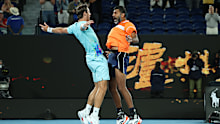 Matthew Ebden of Australia and Rohan Bopanna of India celebrate winning championship point in their Mens Doubles Final match against Simone Bolelli and Andrea Vavassori of Italy during the 2024 Australian Open at Melbourne Park on January 27, 2024 in Melbourne 