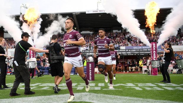 Luke Brooks runs onto the field for Manly against the Roosters in round two.