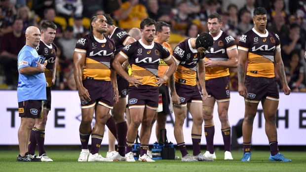 A dejected looking Brisbane Broncos during their round 27 clash against the Storm at Suncorp Stadium.