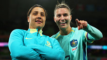 MELBOURNE, AUSTRALIA - JULY 31: Sam Kerr and Steph Catley of Australia applaud fans after the team's 4-0 victory and qualification for the knockout stage following the FIFA Women's World Cup Australia & New Zealand 2023 Group B match between Canada and Australia at Melbourne Rectangular Stadium on July 31, 2023 in Melbourne, Australia. (Photo by Alex Pantling - FIFA/FIFA via Getty Images)