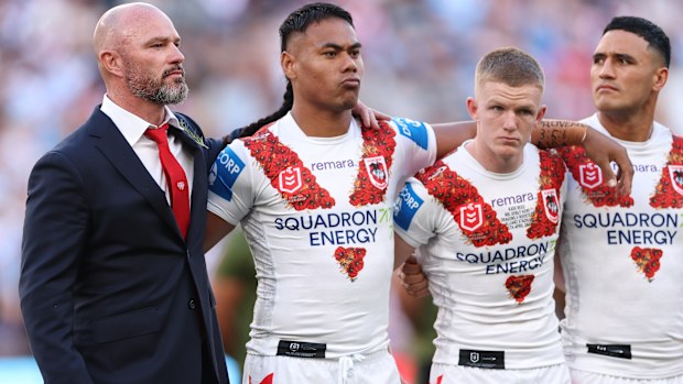 Dean Young, interim head coach of the Dragons with his team on Anzac Day.