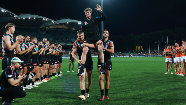 Tom Jonas was chaired off by Ollie Wines and Travis Boak after Port Adelaide was knocked out of the premiership race.