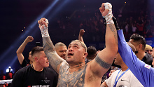 Mark Hunt celebrates his win over Sonny Bill Williams at Aware Super Theatre in Sydney. 