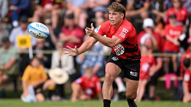 James O'Connor of the Crusaders passes the ball during a Super Rugby trial match in Christchurch.