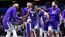 De'Aaron Fox celebrates his match-winning shot to defeat the Orlando Magic.