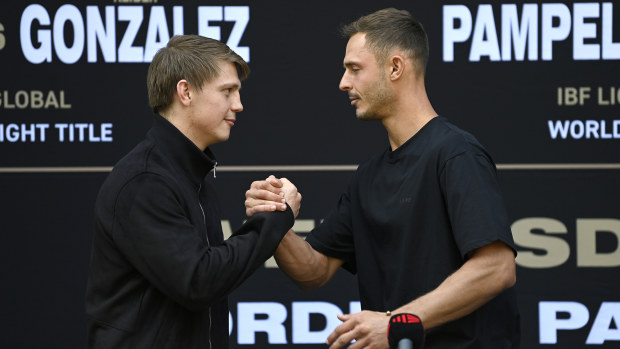Nikita Tszyu and Danilo Creati shake hands at press conference for title fight. (Image: No Limit Boxing).