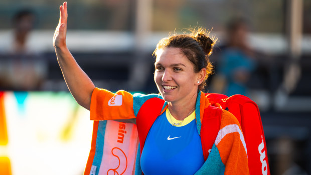 Simona Halep walks off the court after losing to Paula Badosa in the first round at the Miami Open.