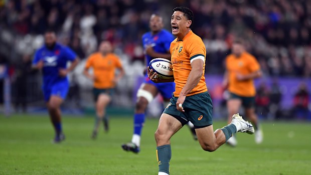 Lalakai Foketi of Australia scores a try.