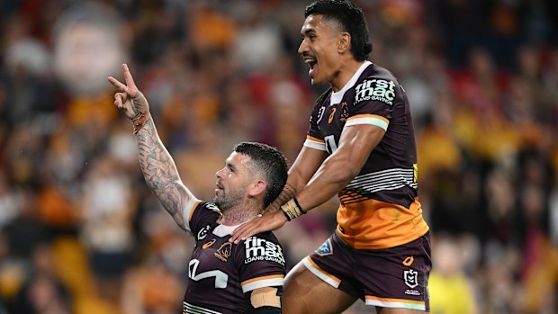 Adam Reynolds celebrates scoring a try during the round 25 NRL match between between the Brisbane Broncos and the Parramatta Eels.