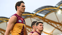 Eric Hipwood (left) and Dayne Zorko trudge off.
