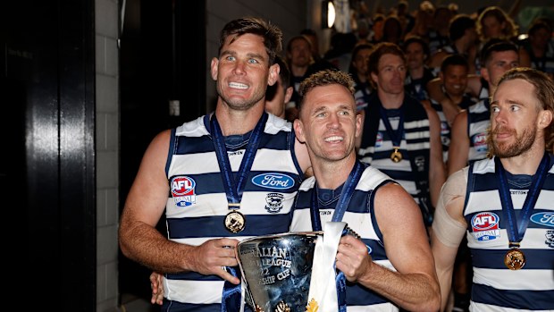 Tom Hawkins and Joel Selwood of the Cats celebrate winning the 2022 AFL grand final.