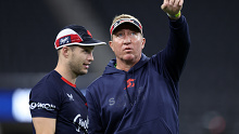 LAS VEGAS, NEVADA - MARCH 01: Sydney Roosters head coach Trent Robinson talks with Sam Walker during the NRL Captain's Run at Allegiant Stadium, on March 01, 2024, in Las Vegas, Nevada. (Photo by Ezra Shaw/Getty Images)