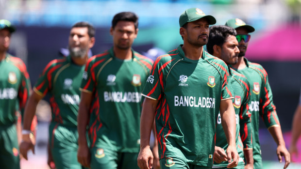 Players of Bangladesh cut dejected figures following the ICC Men's T20 Cricket World Cup West Indies & USA 2024 match between South Africa  and Bangladesh at  Nassau County International Cricket Stadium on June 10, 2024 in New York, New York. (Photo by Robert Cianflone/Getty Images)