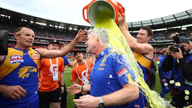 McGovern dumping Gatorade on coach Adam Simpson after the 2018 grand final.