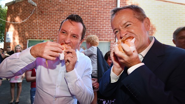 Bill Shorten downed a snag in Perth today. (AAP)
