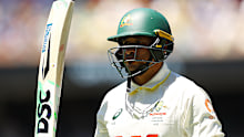 ADELAIDE, AUSTRALIA - DECEMBER 17: Usman Khawaja of Australia walks off the field after being dismissed by Will Jacks of England for 82 runs during day one of the Third Test Match in the 2025-26 Ashes Series between Australia and England at Adelaide Oval on December 17, 2025 in Adelaide, Australia. (Photo by Robert Cianflone/Getty Images)
