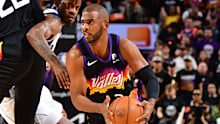 Phoenix's Chris Paul drives to the basket against the Dallas Mavericks.
