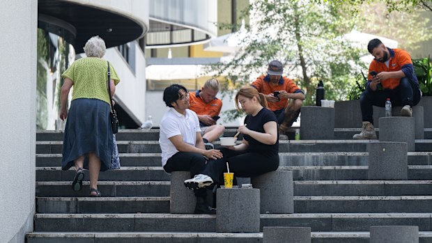 Generic scenes of young professional workers in suits in the CBD