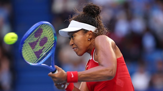 Naomi Osaka of Team Japan plays a backhand in the Women's singles match against Maria Sakkari of Team Greece.