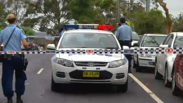 Police at the scene of the stabbing in Punchbowl. (9NEWS)