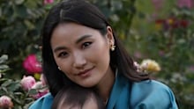 Queen of Bhutan celebrates her 34th birthday with new portrait offering a rare glimpse of her daughter