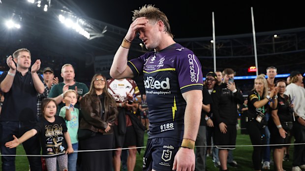 Harry Grant of the Storm walks to the presentation area after the 2024 NRL Grand Final match between the Melbourne Storm and the Penrith Panthers at Accor Stadium on October 06, 2024, in Sydney, Australia. (Photo by Cameron Spencer/Getty Images)