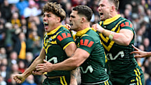 From left: Reece Walsh, Nathan Cleary and Hudson Young celebrate a try on the Kangaroos' Ashes tour.