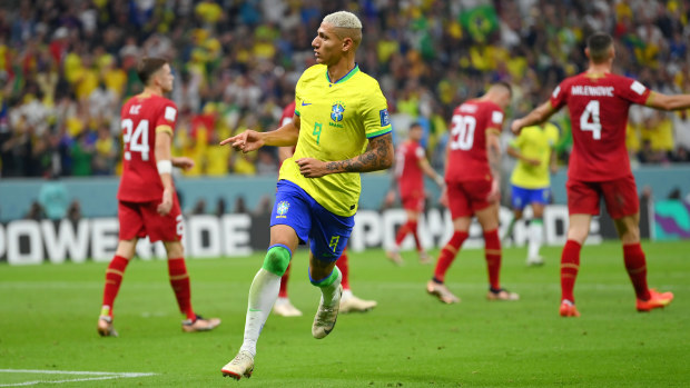 Richarlison of Brazil celebrates after scoring their team's second goal during the FIFA World Cup Qatar 2022 Group G match between Brazil and Serbia at Lusail Stadium on November 24, 2022 in Lusail City, Qatar. (Photo by Justin Setterfield/Getty Images)