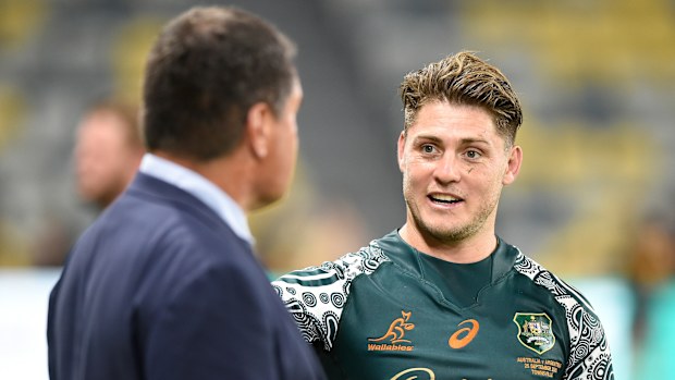James O'Connor of the Wallabies speaks with coach Dave Rennie.