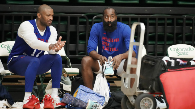 Philadelphia 76ers forward P.J. Tucker, left, chats with guard James Harden during the NBA basketball team's practice on Thursday, Oct. 5, 2023, in Fort Collins, Colo. (AP Photo/David Zalubowski)