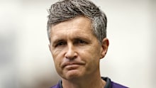 MELBOURNE, AUSTRALIA - AUGUST 26: Senior coach of the Dockers Justin Longmuir gives a media interview before the round 24 AFL match between Hawthorn Hawks and Fremantle Dockers at Melbourne Cricket Ground, on August 26, 2023, in Melbourne, Australia. (Photo by Darrian Traynor/Getty Images)