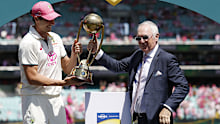 Pat Cummins is awarded the Border-Gavaskar Trophy. 
