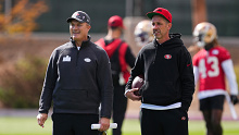 LAS VEGAS, NEVADA - FEBRUARY 07: (L-R) General manager John Lynch and head coach Kyle Shanahan look on during San Francisco 49ers practice ahead of Super Bowl LVIII at Fertitta Football Complex on February 07, 2024 in Las Vegas, Nevada. (Photo by Chris Unger/Getty Images)